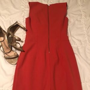 Beautiful salmon color, sleeveless, knee length dress.